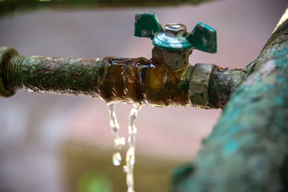 pipes from mains water supply corroded and leaking causing low water pressure into house