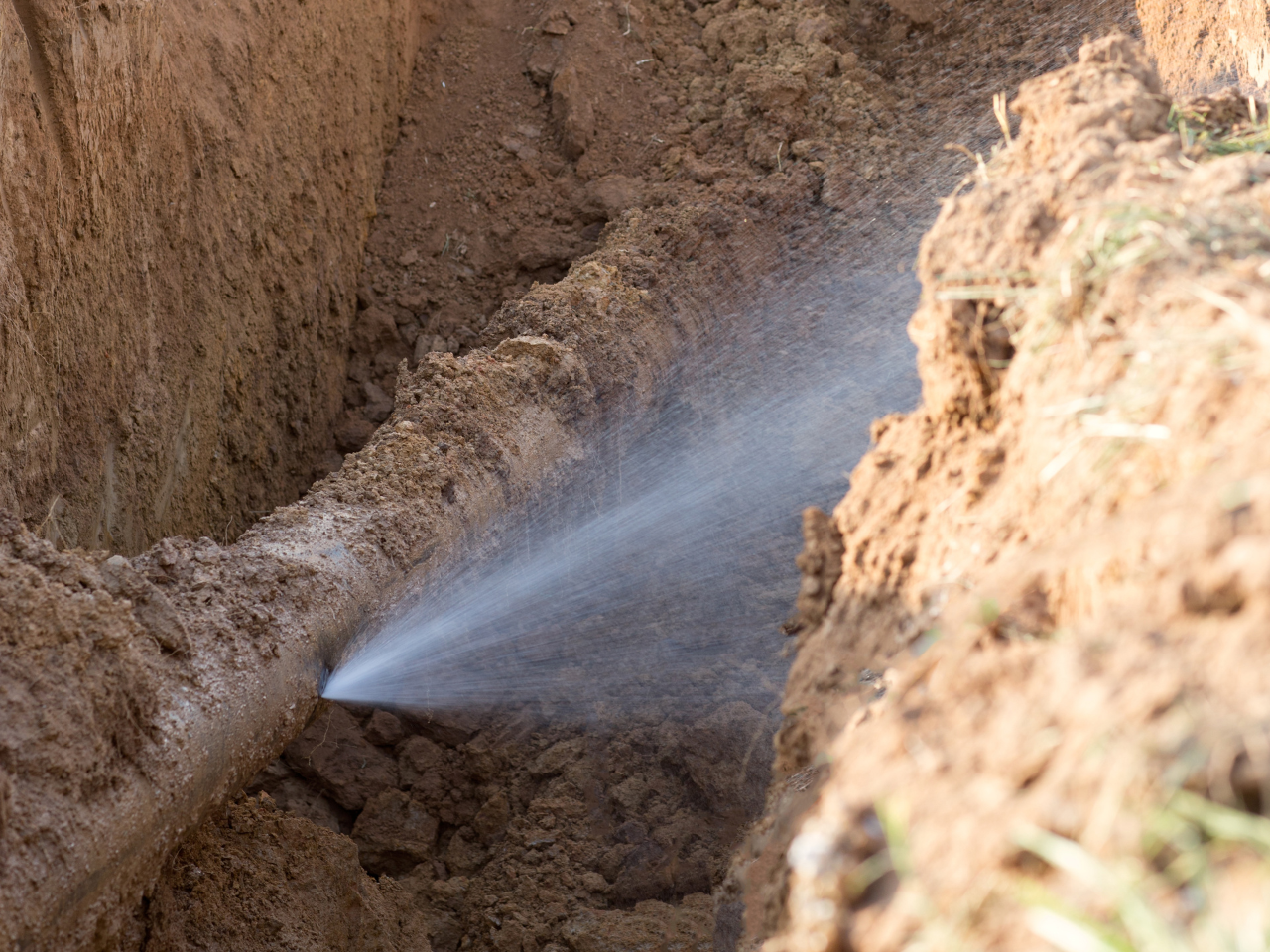 Burst underground water pipe