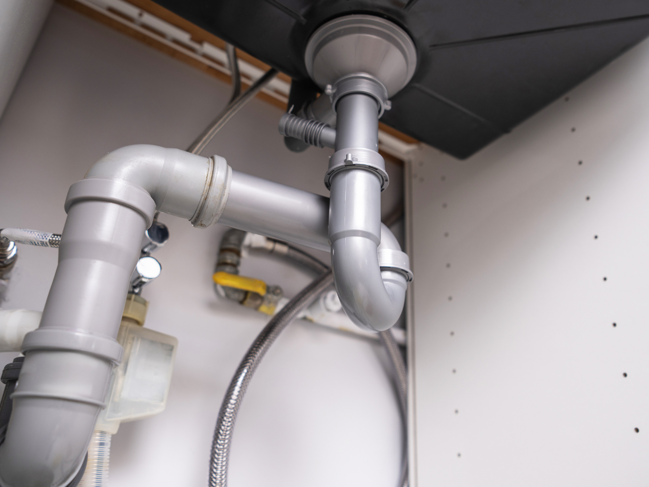 Underneath Kitchen sink Plumbing system