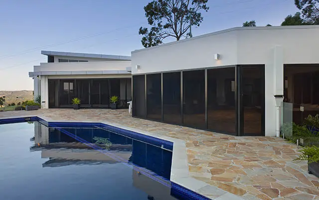 Custom Security doors installed to cover doors and windows around the outside of entire house