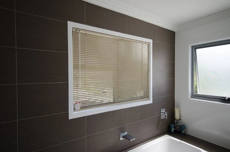 Aluminium Venetian blinds with professional installation in bathroom window by Moreton Bay Security Solutions