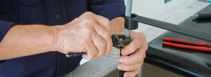 Fixing a tap in the kitchen