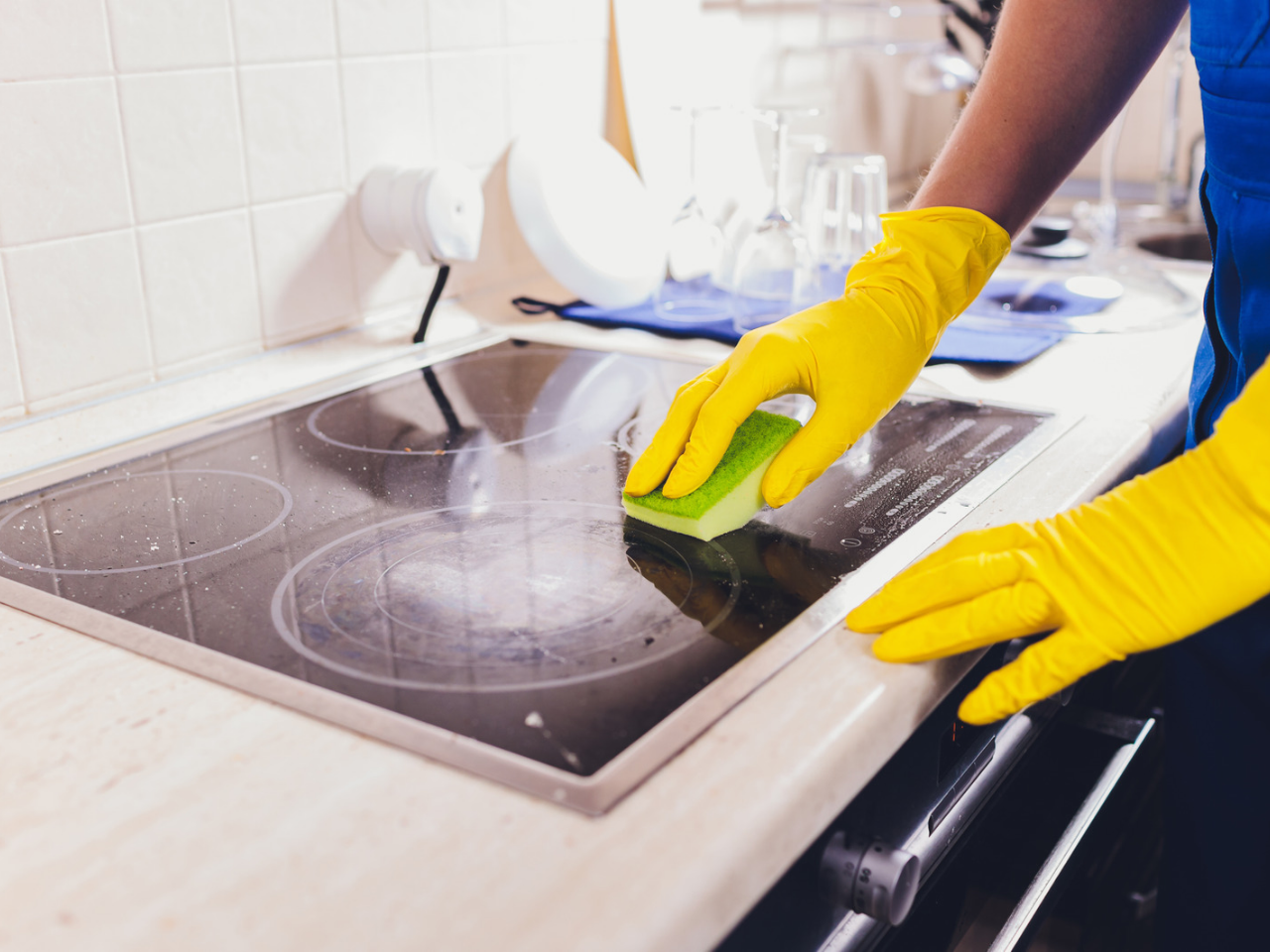 Cleaning Stove top of a residential home