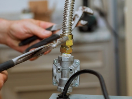 Gas Fitter Ensuring Safety of Gas Line