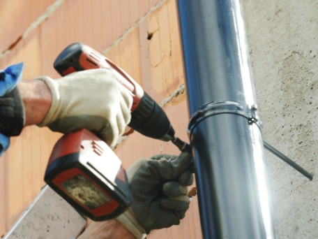 Gutters being installed