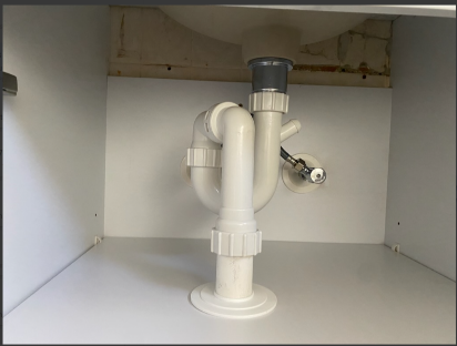 plumbing under sink