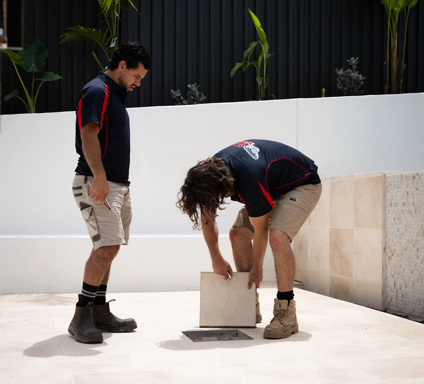 Team members checking drainage