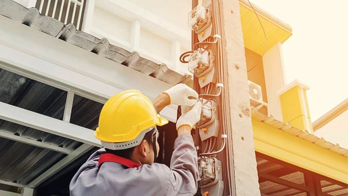 Level Two Electrician Working on power pole