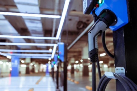 Public garage with EV charger system installed by expert electricians at EV Charger Installation in Sydney. This DC charging system is scalable so it is future-proof