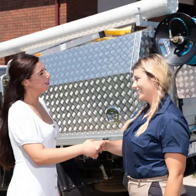 Professional Gas Plumber greeting customer