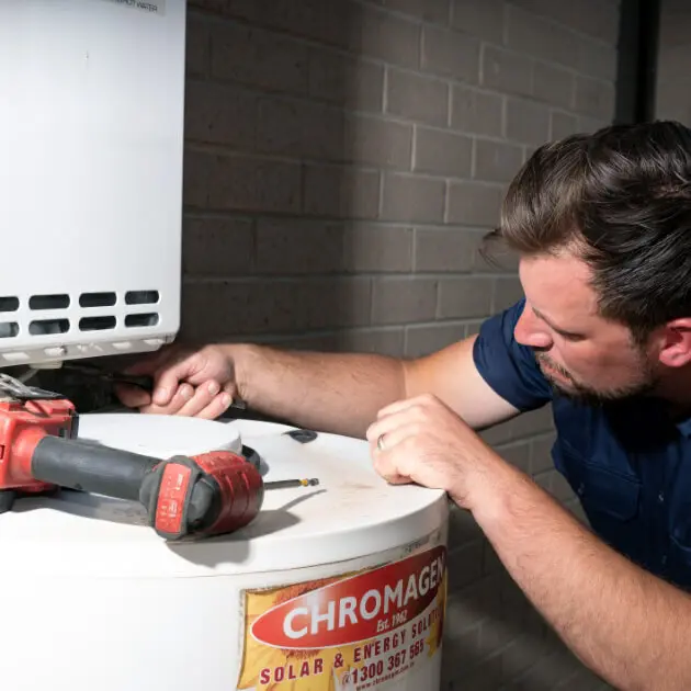 Our plumber fixing a solar hot water system
