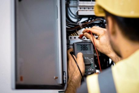 Electrician working on a switchboard
