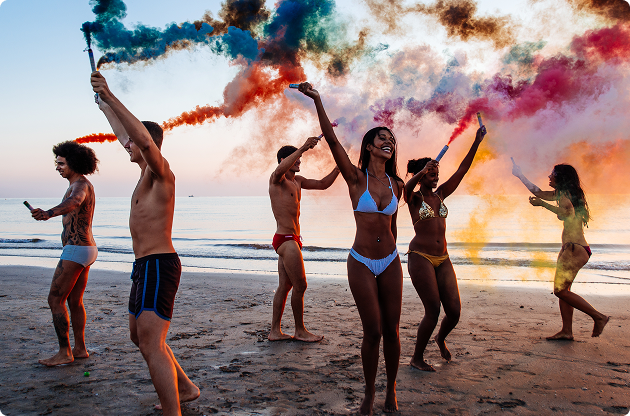 Yacht crew members socializing and networking in a beautiful outdoor setting