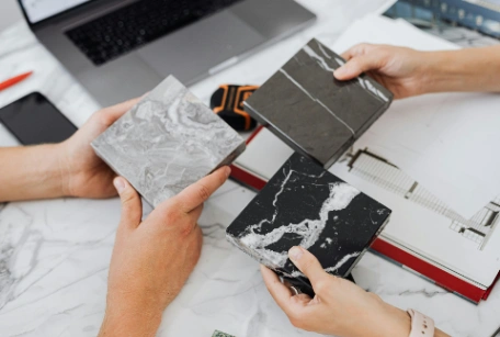 different tile styles and colours being compared for kitchen splashback tiles
