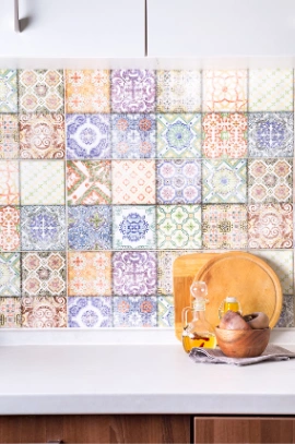 Varied pattern tiles kitchen splashback tiling