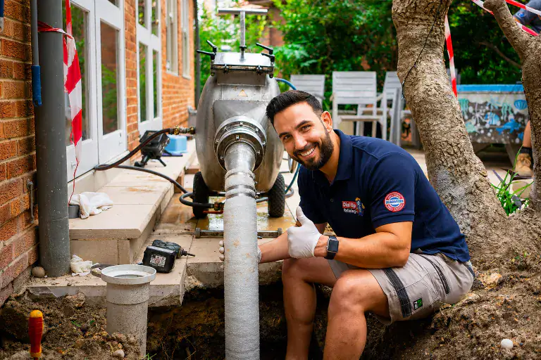 Plumber with drain equipment