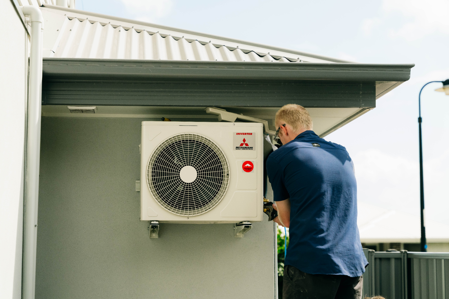 Air conditioning technician on site