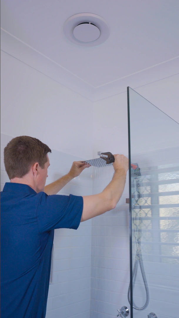 Geoff doing a shower tap repair